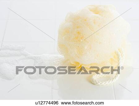 Close up of soapy body scrubber View Large Photo Image Stock Photograph - Close up of soapy body scrubber. Fotosearch