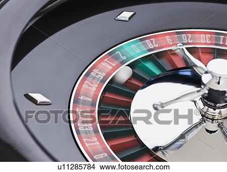 Close up of spinning roulette table View Large Photo Image Picture - Close up of spinning roulette table. Fotosearch