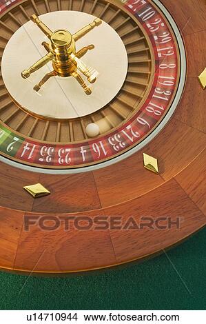 Close up of spinning roulette wheel View Large Photo Image Picture - Close up of spinning roulette wheel. Fotosearch