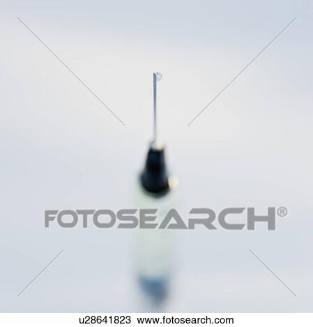 Stock Image - Close up of syringe. Fotosearch