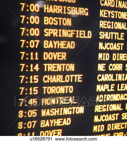 Stock Image - Close up of transportation time table, New York, United States. Fotosearch