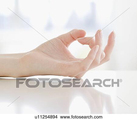 Picture - Close up of woman’s hand. Fotosearch