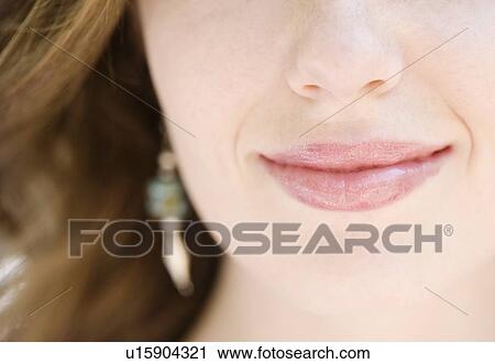 Stock Image - Close up of woman’s lips. Fotosearch