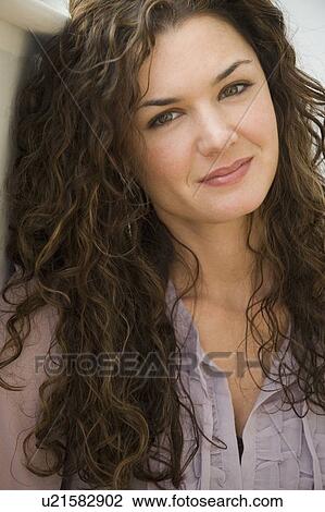 Close up portrait of smiling woman View Large Photo Image Stock Image - Close up portrait of smiling woman. Fotosearch