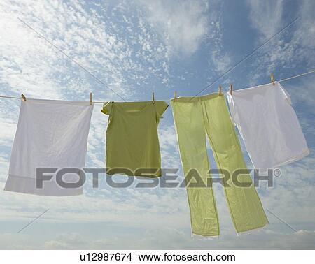 Picture - Clothes hanging from clothesline. Fotosearch