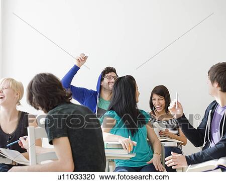 Stock Image - College students in classroom. Fotosearch