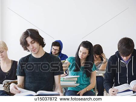 Stock Image - College students in classroom. Fotosearch