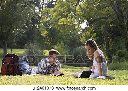 College students studying in grass View Large Photo Image Stock Image - College students studying in grass. Fotosearch