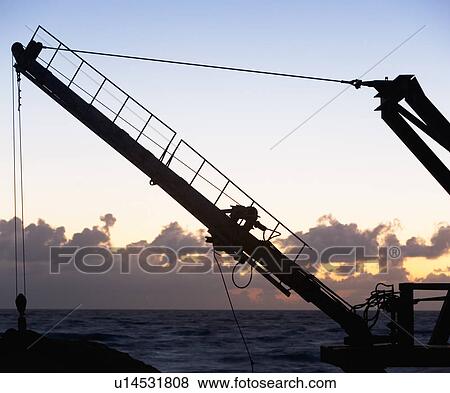 Construction crane in front of water View Large Photo Image Stock Photo - Construction crane in front of water. Fotosearch