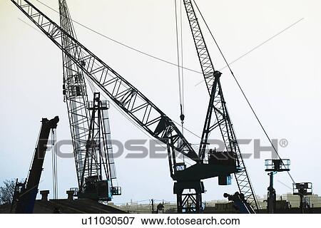 Stock Photo - construction cranes. Fotosearch