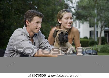 Couple and dog in back of truck View Large Photo Image Stock Photo - Couple and dog in back of truck. Fotosearch