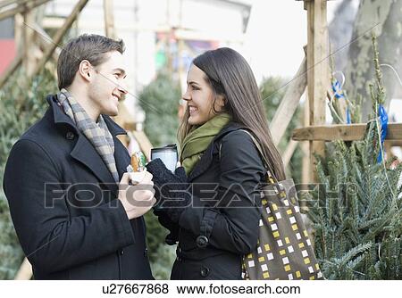 Stock Photo - Couple smiling at each other. Fotosearch