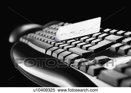 Credit card on computer keyboard View Large Photo Image Stock Photography - Credit card on computer keyboard. Fotosearch