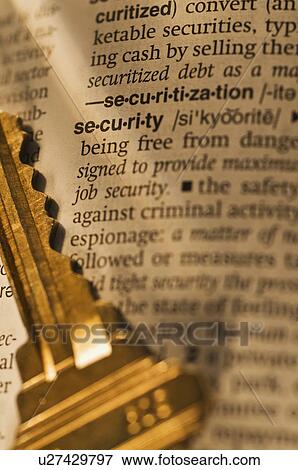 Stock Photo - Definition of security in dictionary and key. Fotosearch
