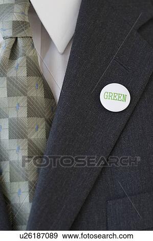 Eco-friendly button on businessman’s lapel View Large Photo Image Stock Photo - Eco-friendly button on businessman’s lapel. Fotosearch