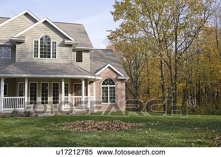 Stock Photography - Facade of house in autumn. Fotosearch