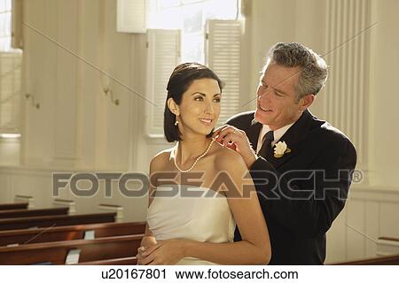 Father fastening bride’s necklace View Large Photo Image Stock Image - Father fastening bride’s necklace. Fotosearch