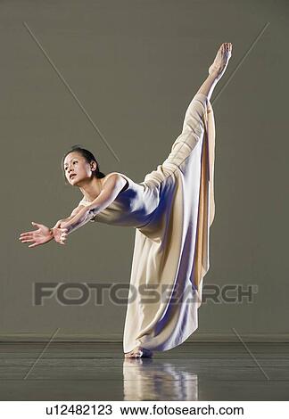 Female ballet dancer dancing View Large Photo Image Stock Image - Female ballet dancer dancing. Fotosearch