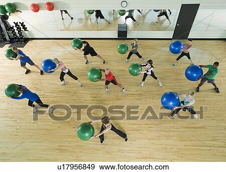 Fitness class holding balance balls View Large Photo Image Stock Photo - Fitness class holding balance balls. Fotosearch