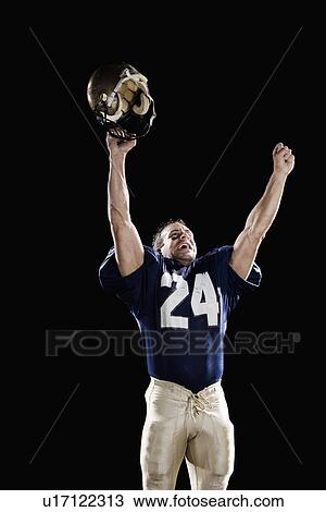 Stock Image - Football player celebrating. Fotosearch