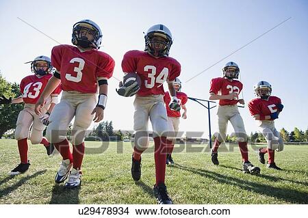 Football players on field View Large Photo Image Picture - Football players on field. Fotosearch