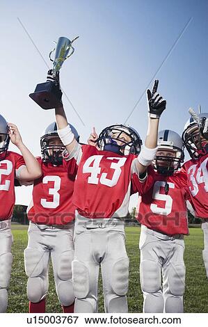 Football team with trophy View Large Photo Image Stock Photo - Football team with trophy. Fotosearch