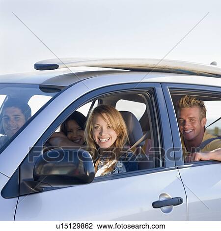 Friends driving in car View Large Photo Image Stock Image - Friends driving in car. Fotosearch