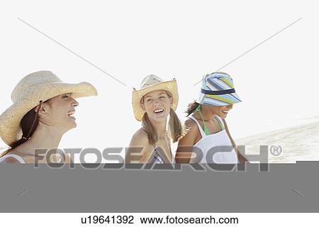 Friends walking on beach View Large Photo Image Stock Image - Friends walking on beach. Fotosearch