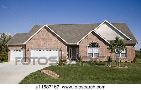 Front view of house with garage View Large Photo Image Stock Photo - Front view of house with garage. Fotosearch