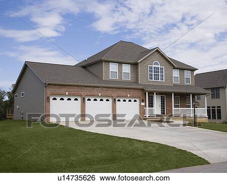 Front view of house with garage View Large Photo Image Stock Photograph - Front view of house with garage. Fotosearch
