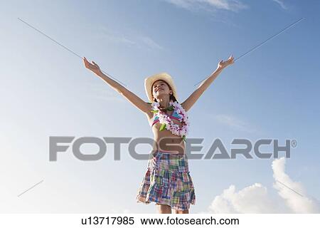 Girl in bathing suit with lei around neck View Large Photo Image Stock Photography - Girl in bathing suit with lei around neck. Fotosearch