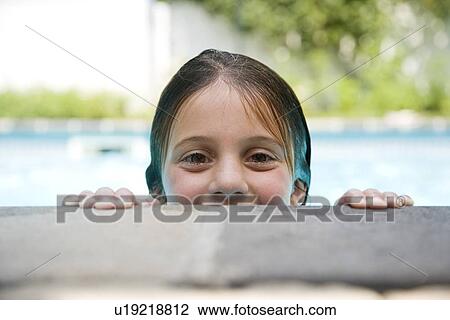Girl peeking over edge of swimming pool View Large Photo Image Stock Image - Girl peeking over edge of swimming pool. Fotosearch