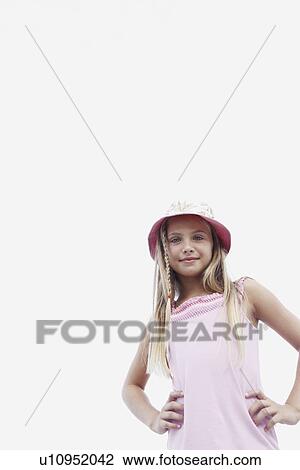 Stock Image - Girl posing with hands on hips. Fotosearch