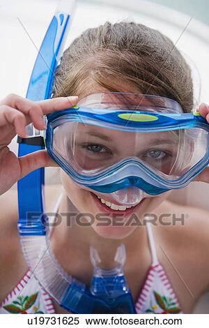 Stock Photography - Girl wearing snorkeling gear. Fotosearch