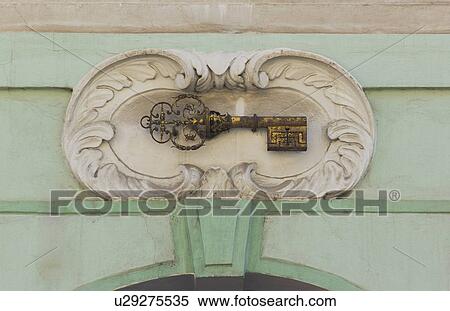 Gold key plaque to identify house, Prague View Large Photo Image Stock Photography - Gold key plaque to identify house, Prague. Fotosearch
