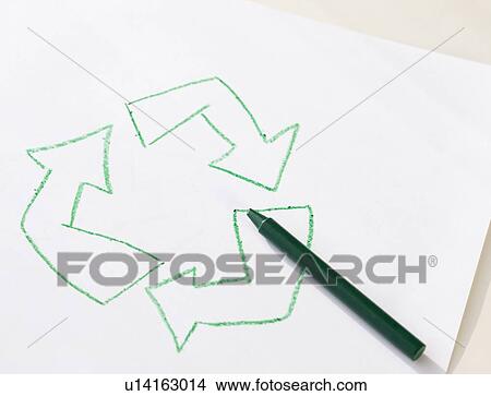 Green crayon next to recycling symbol View Large Photo Image Picture - Green crayon next to recycling symbol. Fotosearch