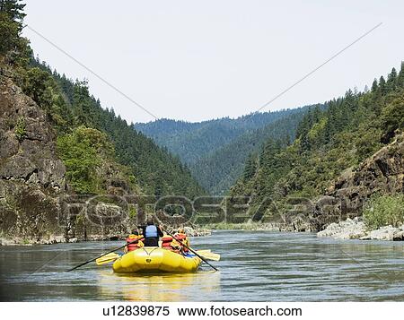 Stock Photography - Group whitewater rafting. Fotosearch
