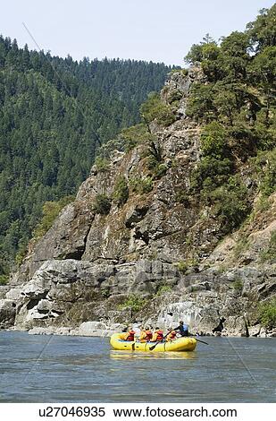 Stock Photography - Group whitewater rafting. Fotosearch