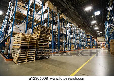 Interior view of warehouse View Large Photo Image Stock Photo - Interior view of warehouse. Fotosearch