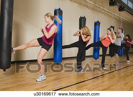 Stock Photo - Kickboxing class. Fotosearch