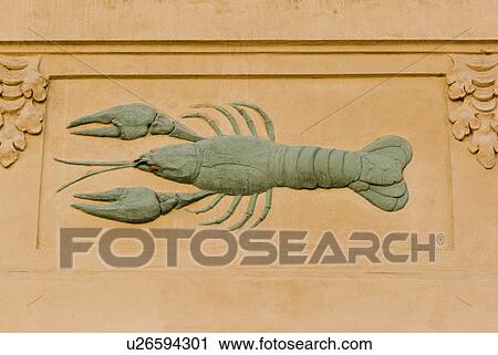 Stock Image - Lobster carving to identify house, Prague. Fotosearch