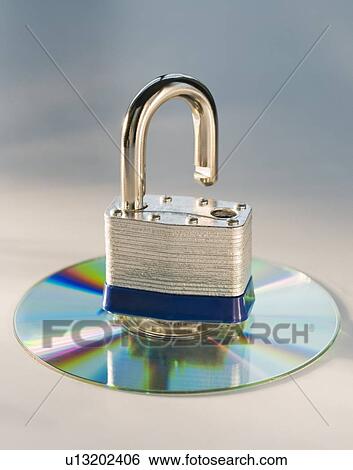 Lock and compact disc View Large Photo Image Stock Photograph - Lock and compact disc. Fotosearch