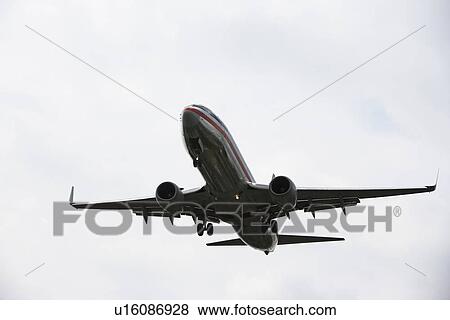 Stock Photo - Low angle view of airplane. Fotosearch