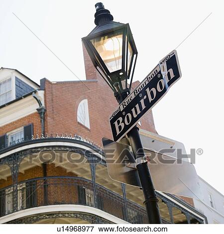 Stock Photo - Low angle view of Bourbon Street sign, French Quarter, New Orleans, Louisiana, United States. Fotosearch
