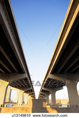 Low angle view of elevated highways View Large Photo Image Stock Photo - Low angle view of elevated highways. Fotosearch