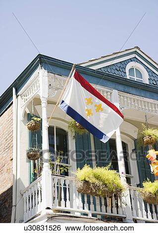 Low angle view of flag on balcony, French Quarter, New Orleans, Louisiana, United States View Large Photo Image Stock Photograph - Low angle view of flag on balcony, French Quarter, New Orleans, Louisiana, United States. Fotosearch