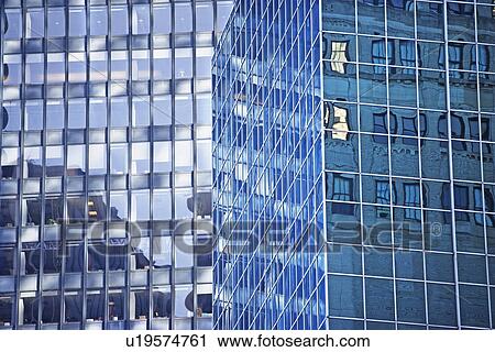 Stock Image - Low angle view of high rises, New York City, New York, United States. Fotosearch
