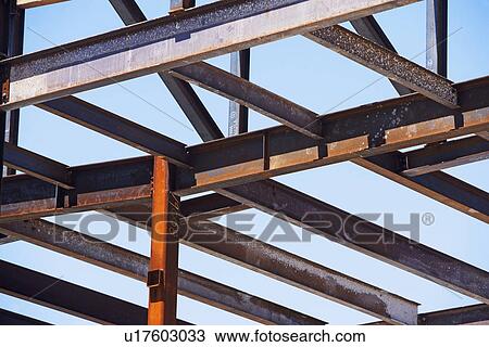 Low angle view of steel beams at construction site View Large Photo Image Stock Image - Low angle view of steel beams at construction site. Fotosearch