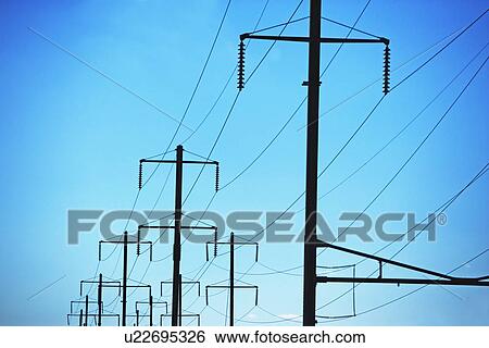 Low angle view of utility poles View Large Photo Image Stock Photograph - Low angle view of utility poles. Fotosearch