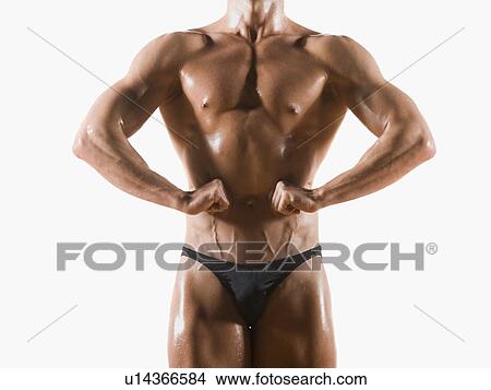 Male body builder flexing and posing View Large Photo Image Picture - Male body builder flexing and posing. Fotosearch
